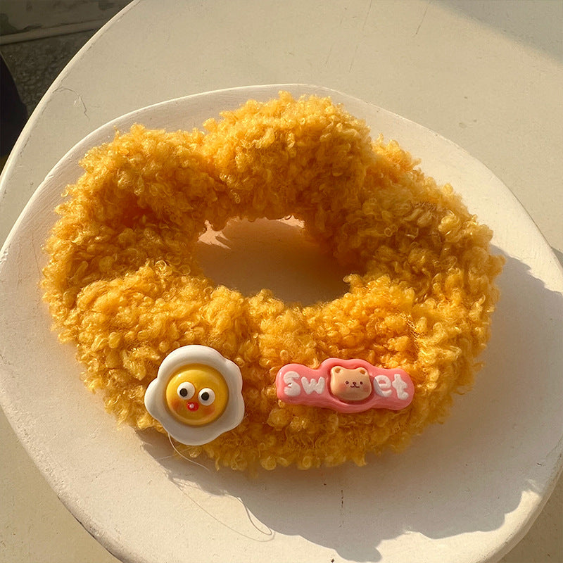 Chouchou en peluche agneau au thé au lait et frangipanier