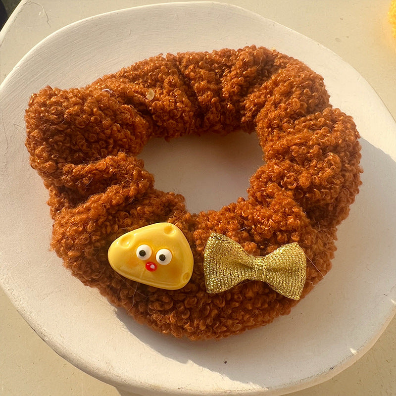 Chouchou en peluche agneau au thé au lait et frangipanier