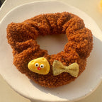 Chouchou en peluche agneau au thé au lait et frangipanier